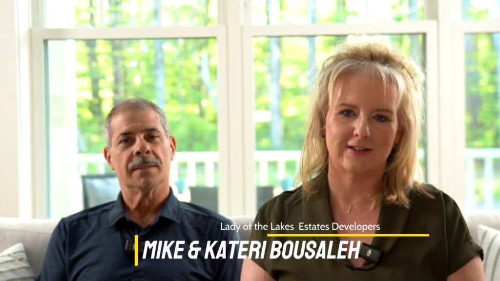 Mike Bousaleh and Kateri MacDonald Bousaleh, developers and homeowners at Lady of the Lakes Estates, seated together during an interview about the Laconia, New Hampshire Lady of the Lakes Estates community.